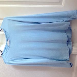 Light weight tee with a pretty blue color and a thumbhole also is a XL.